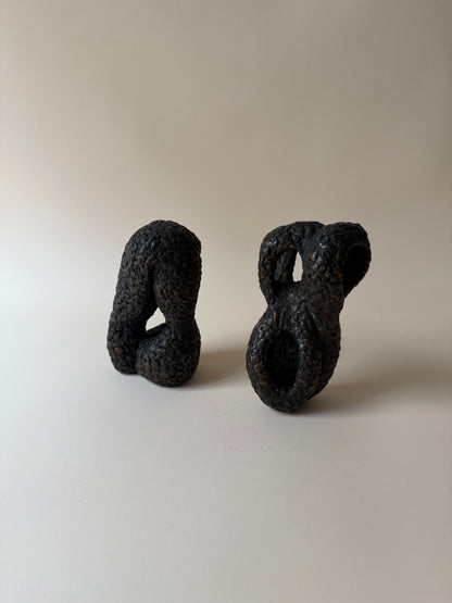 pair of modernist biomorphic bronze sculptures