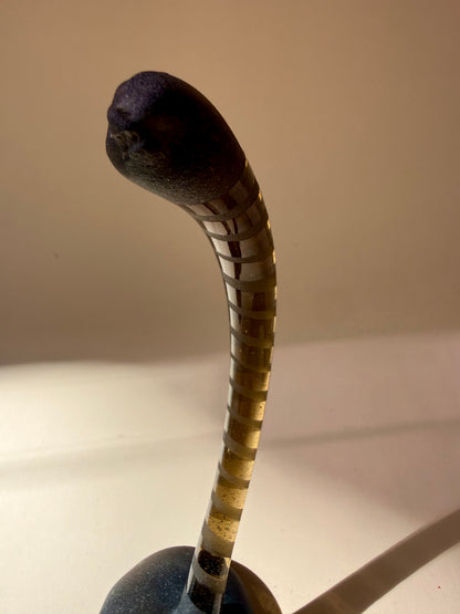 pair of handblown amber glass snake-like abstract sculptures