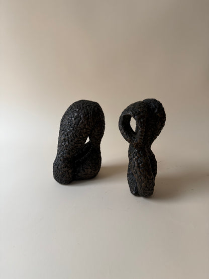 pair of modernist biomorphic bronze sculptures