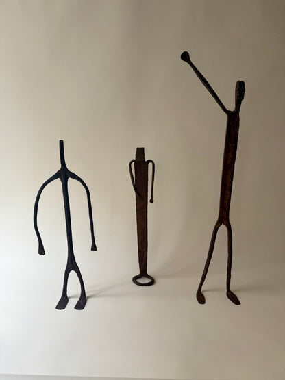 trio of hand-forged iron figural sculptures