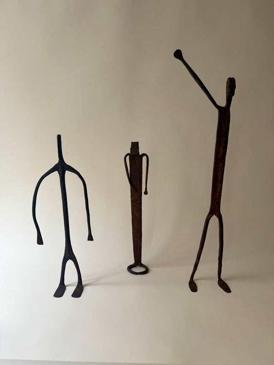 trio of hand-forged iron figural sculptures