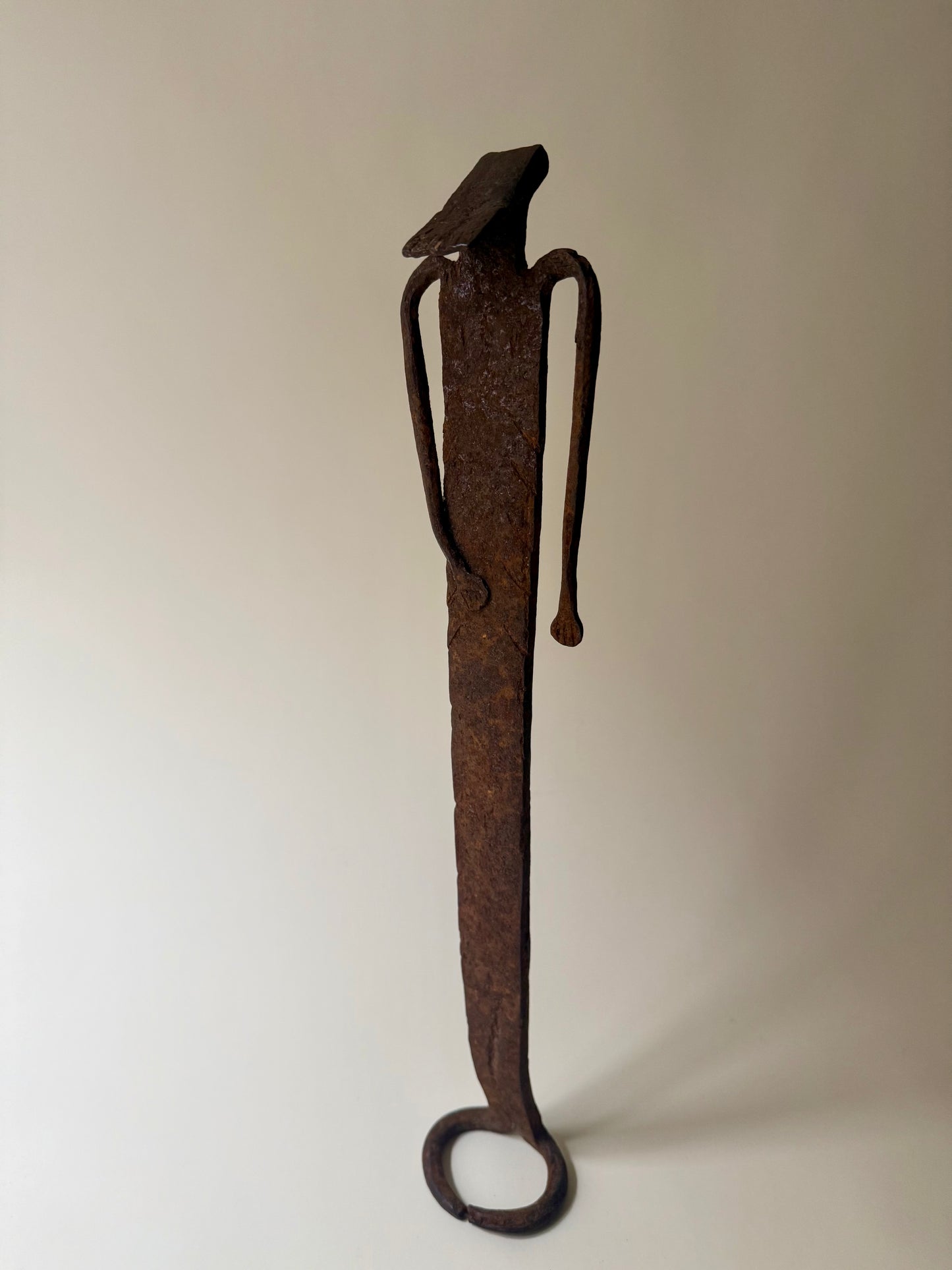 trio of hand-forged iron figural sculptures
