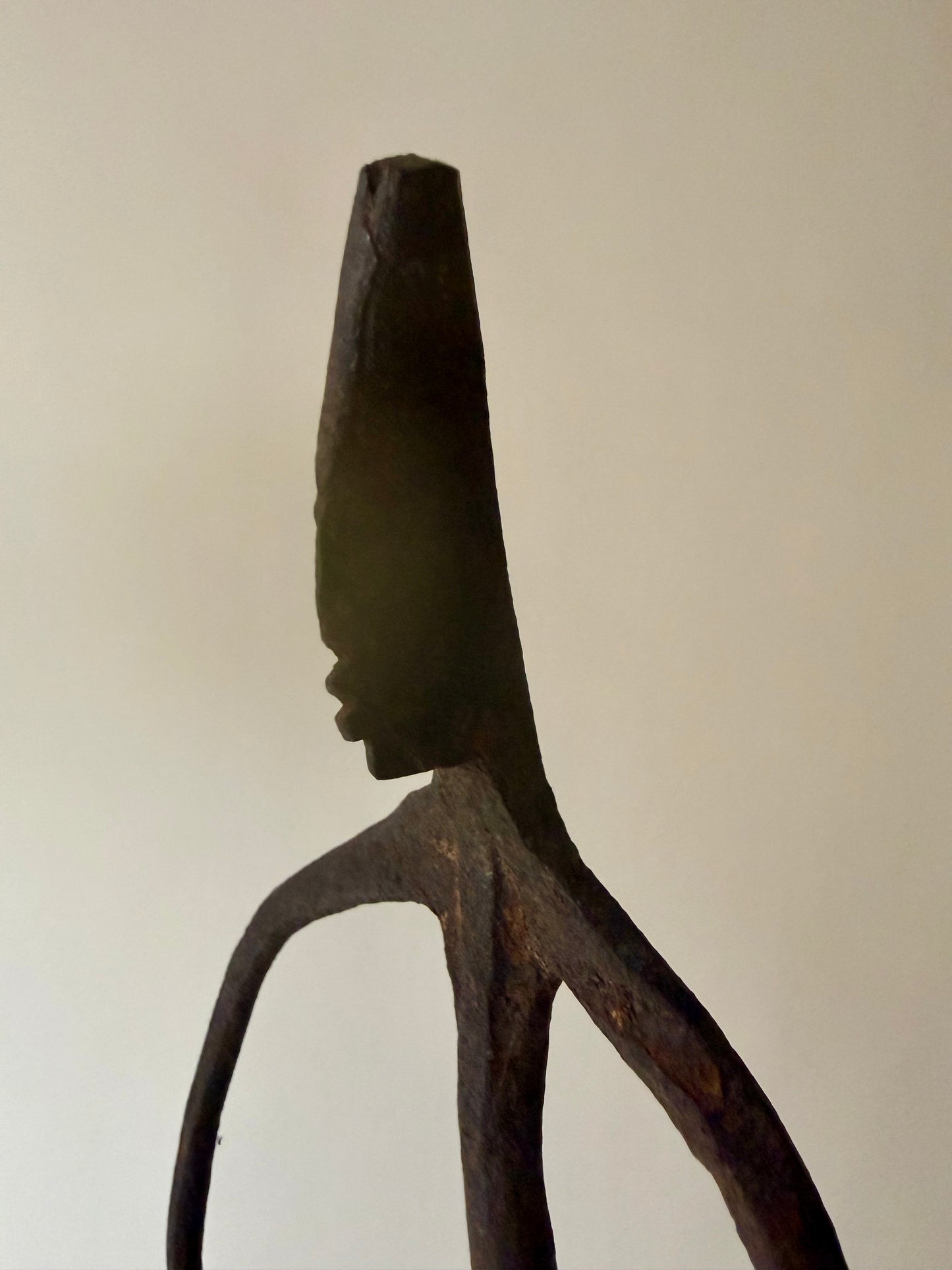 trio of hand-forged iron figural sculptures