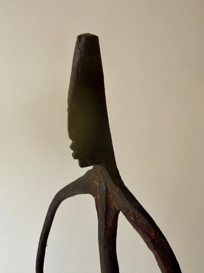 trio of hand-forged iron figural sculptures