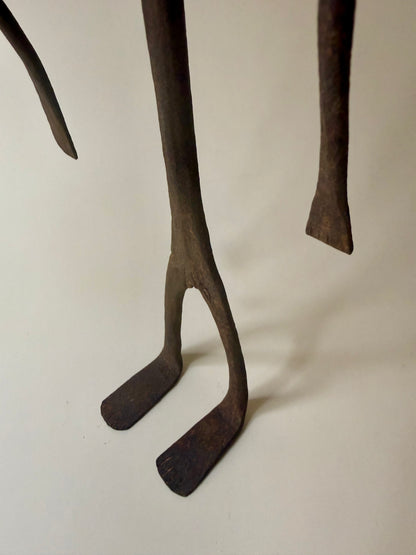 trio of hand-forged iron figural sculptures
