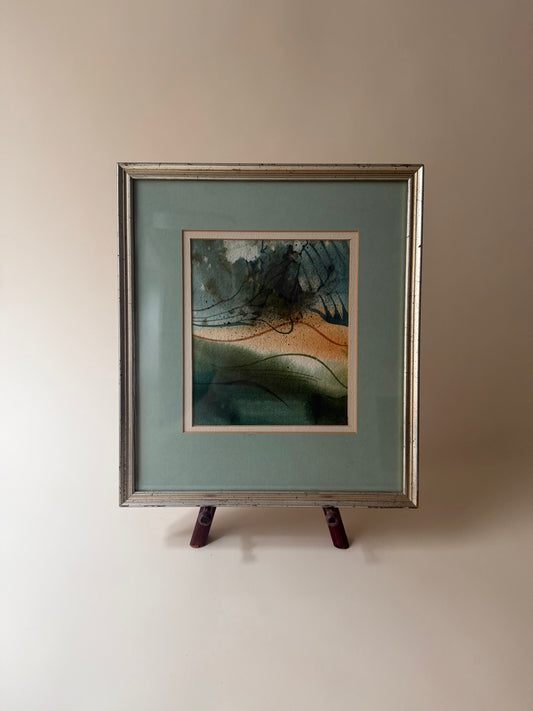 vintage abstract watercolor with blues and greens in silver frame.