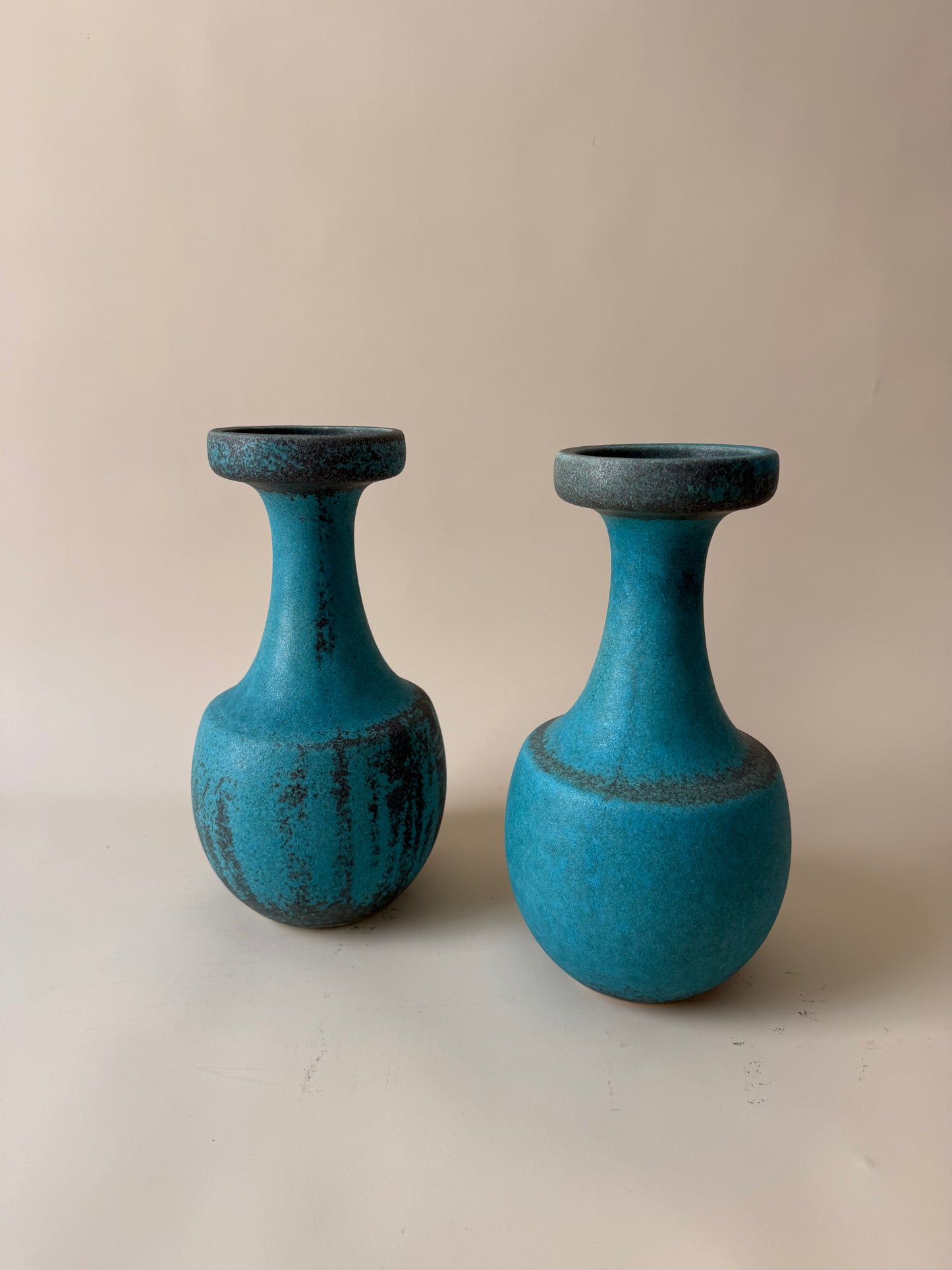 vintage pair of mid century modern turquoise matte ceramic vases attributed to Jaru