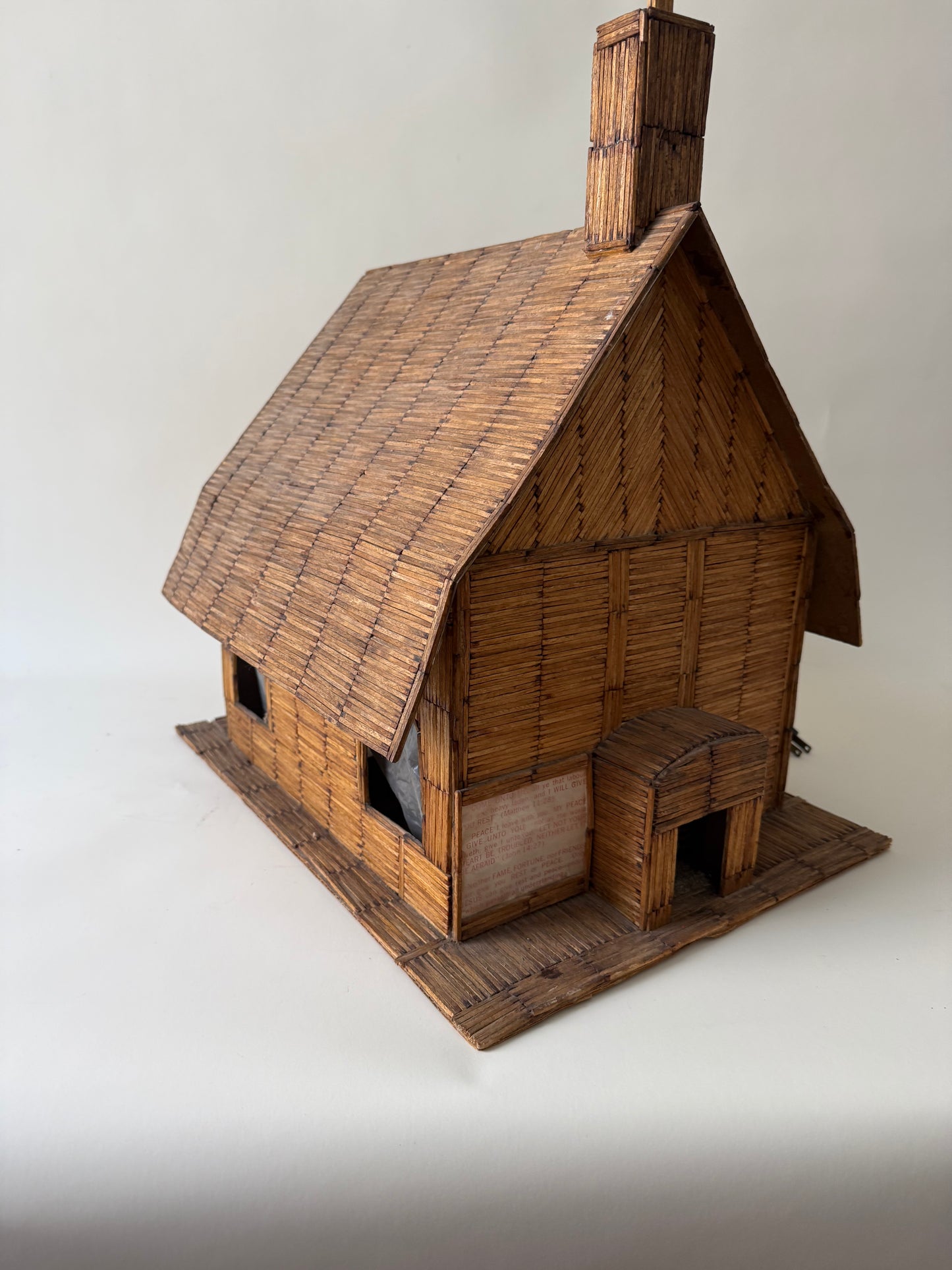 vintage folk art matchstick church with red light