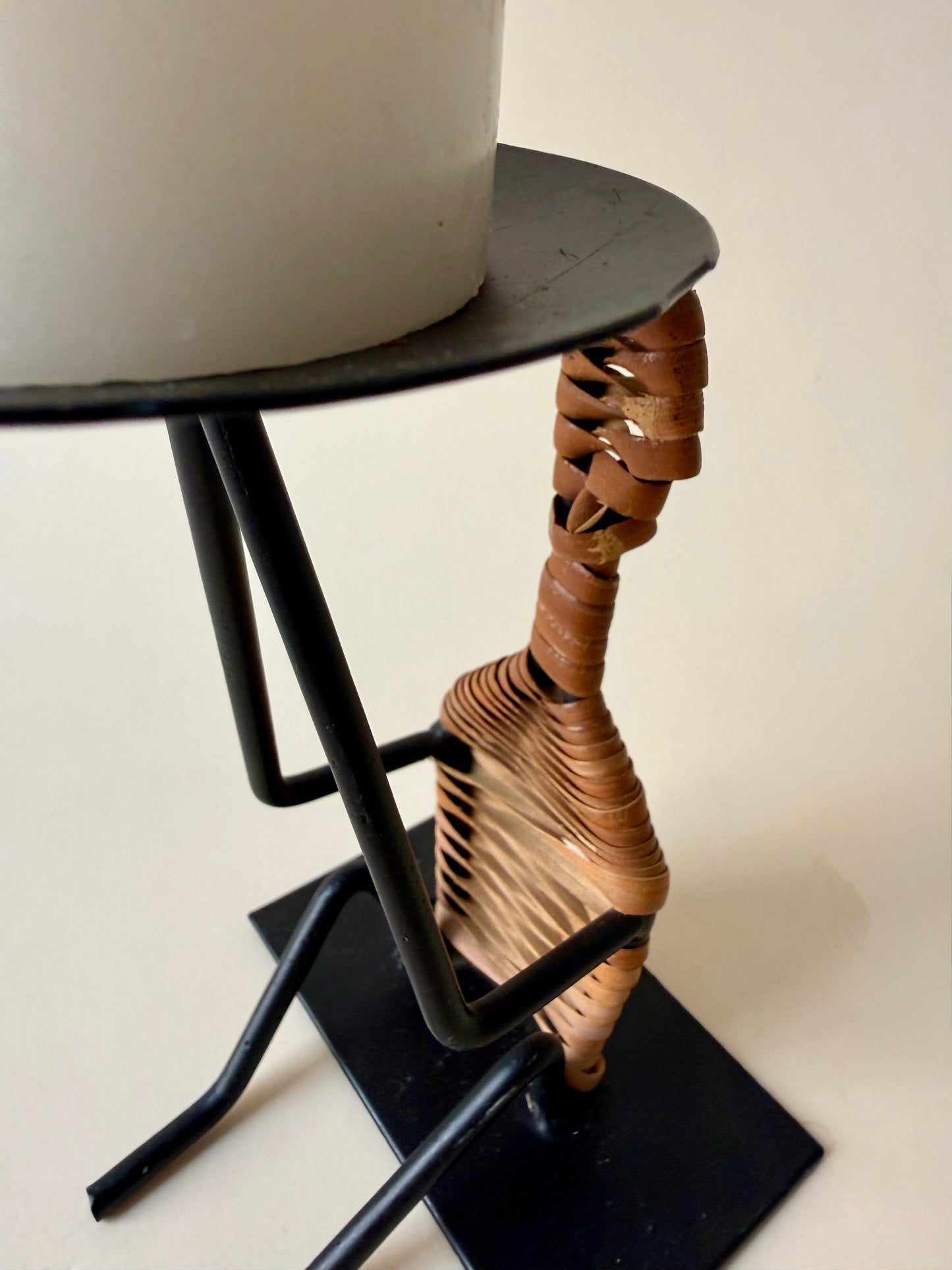 figural iron and rattan candle holder