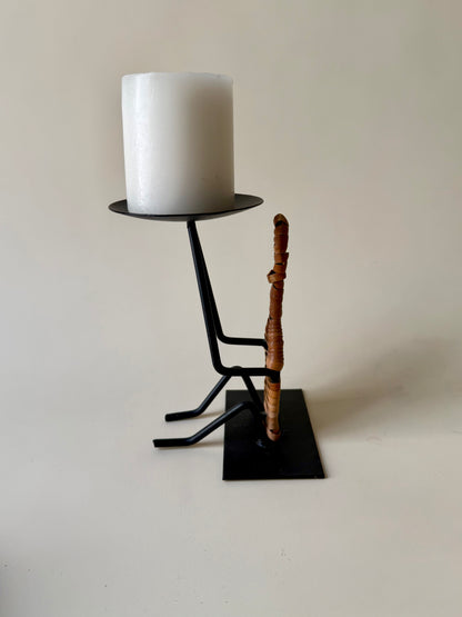 figural iron and rattan candle holder