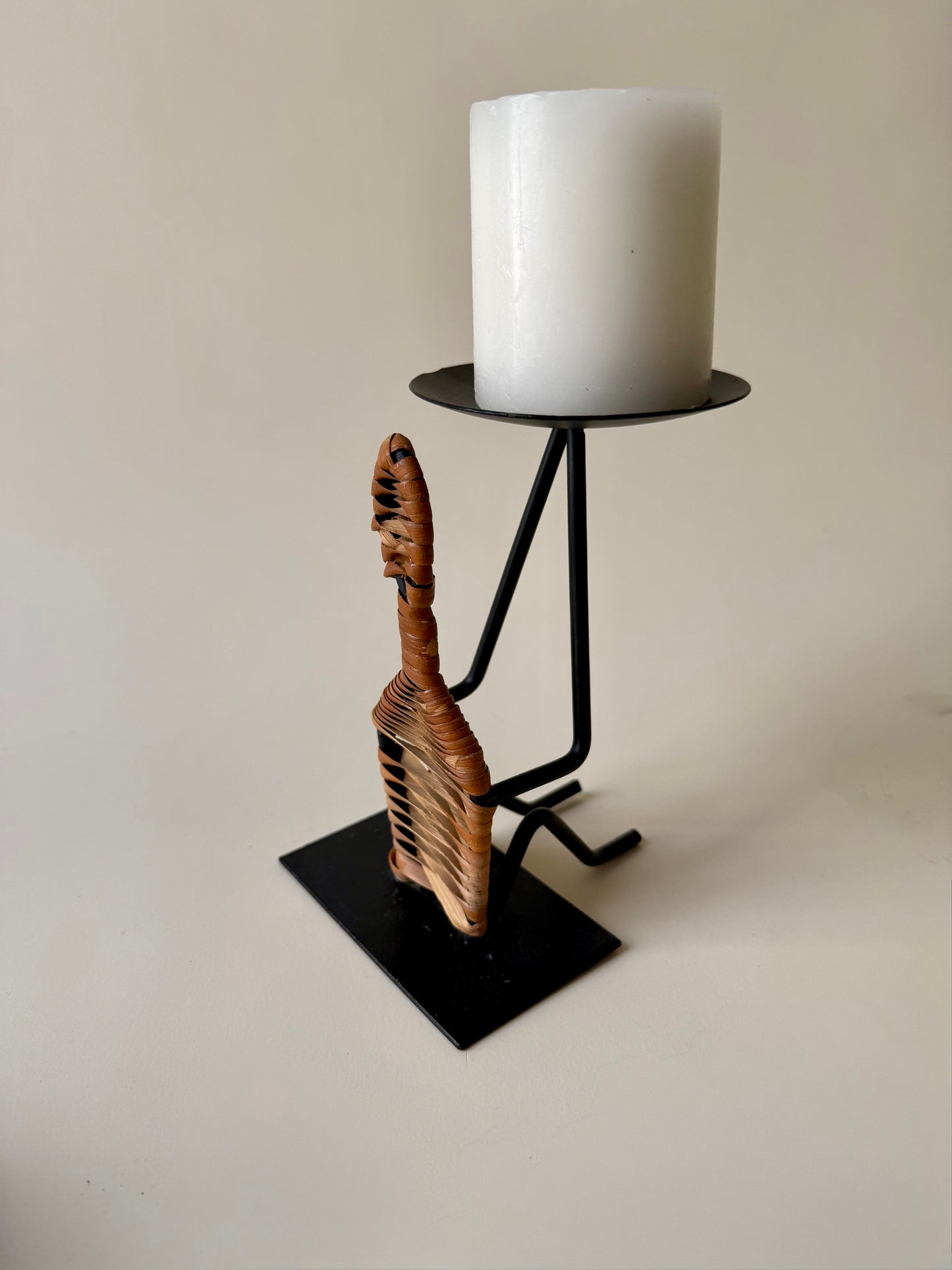 figural iron and rattan candle holder