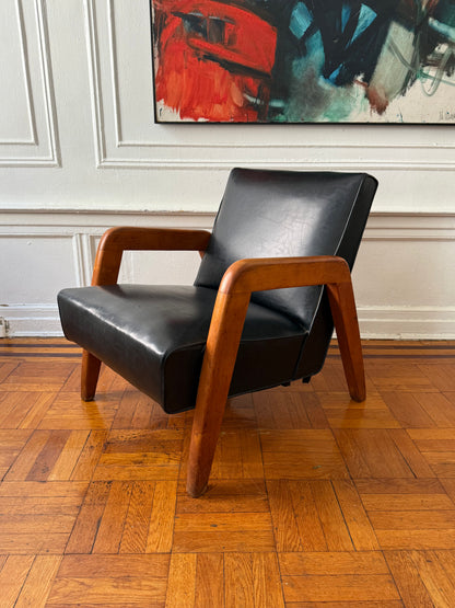 early mid century modern vinly and wood lounge chair attributed to Russel Wright