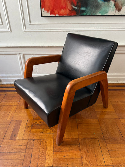 early mid century modern vinly and wood lounge chair attributed to Russel Wright