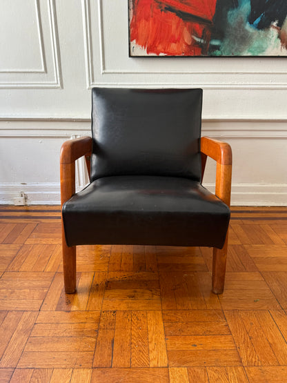 early mid century modern vinly and wood lounge chair attributed to Russel Wright