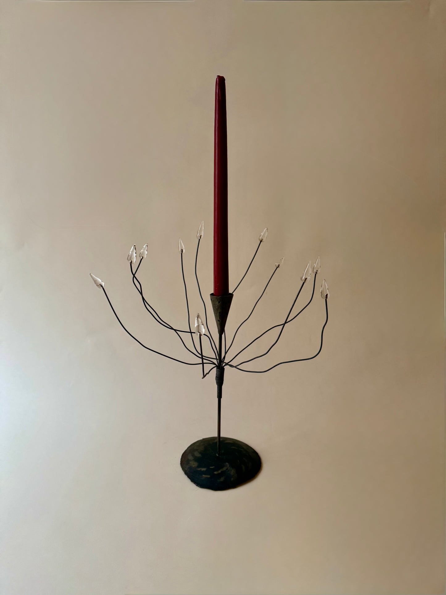 hand forged iron taper candle holder with possible wires with glass tips
