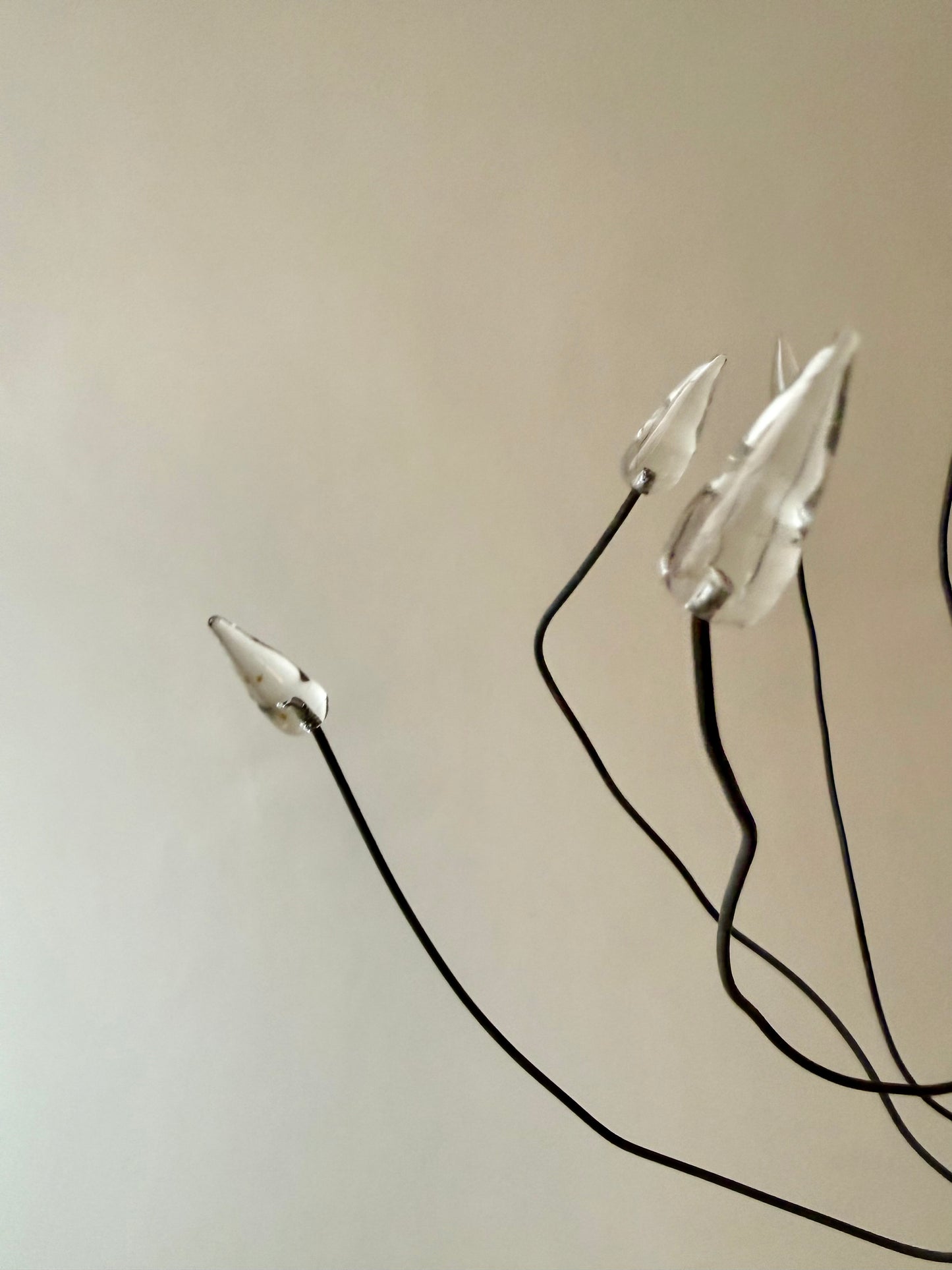 hand forged iron taper candle holder with possible wires with glass tips