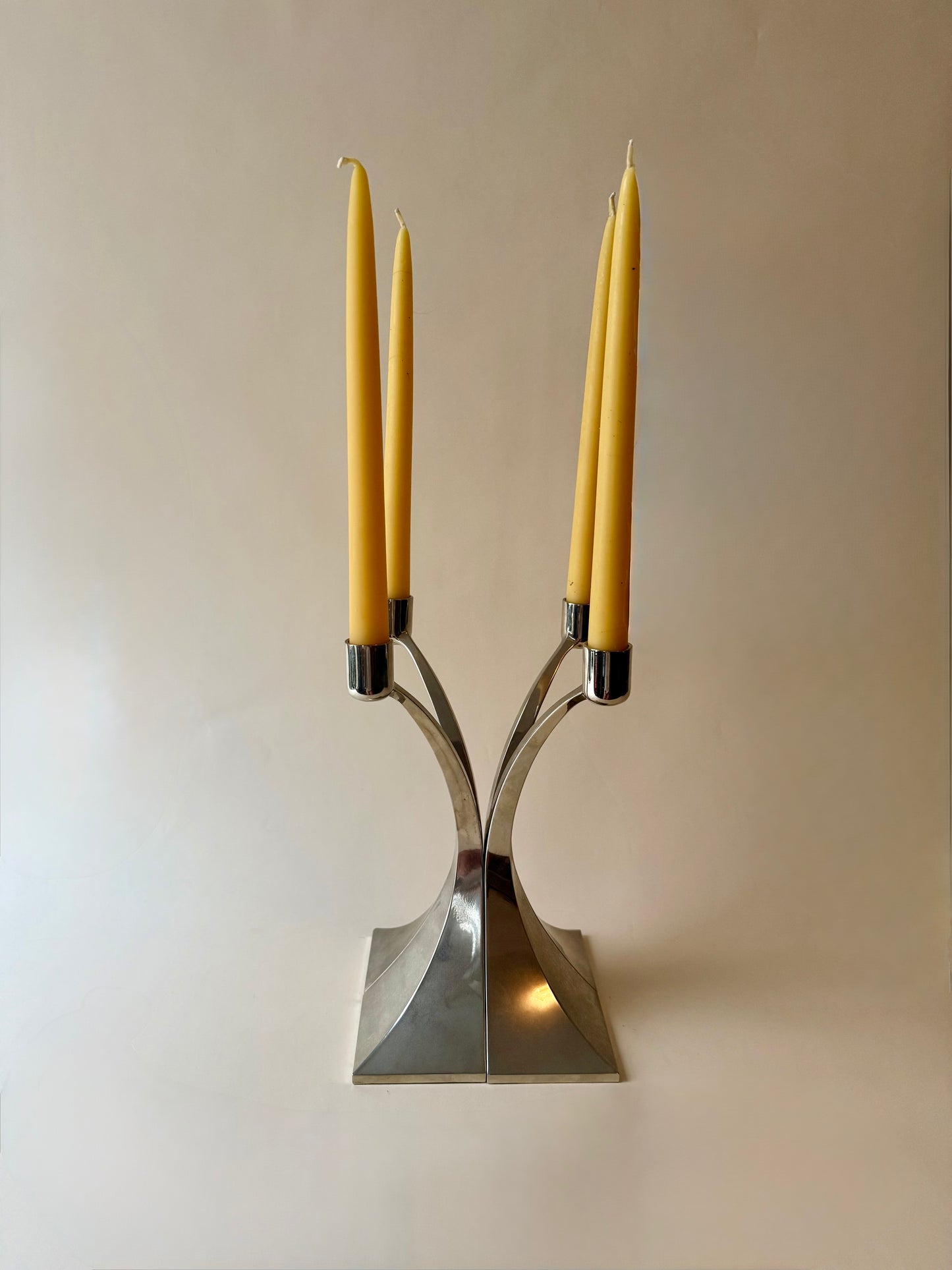 set of 4 curves chrome modernist candleholders