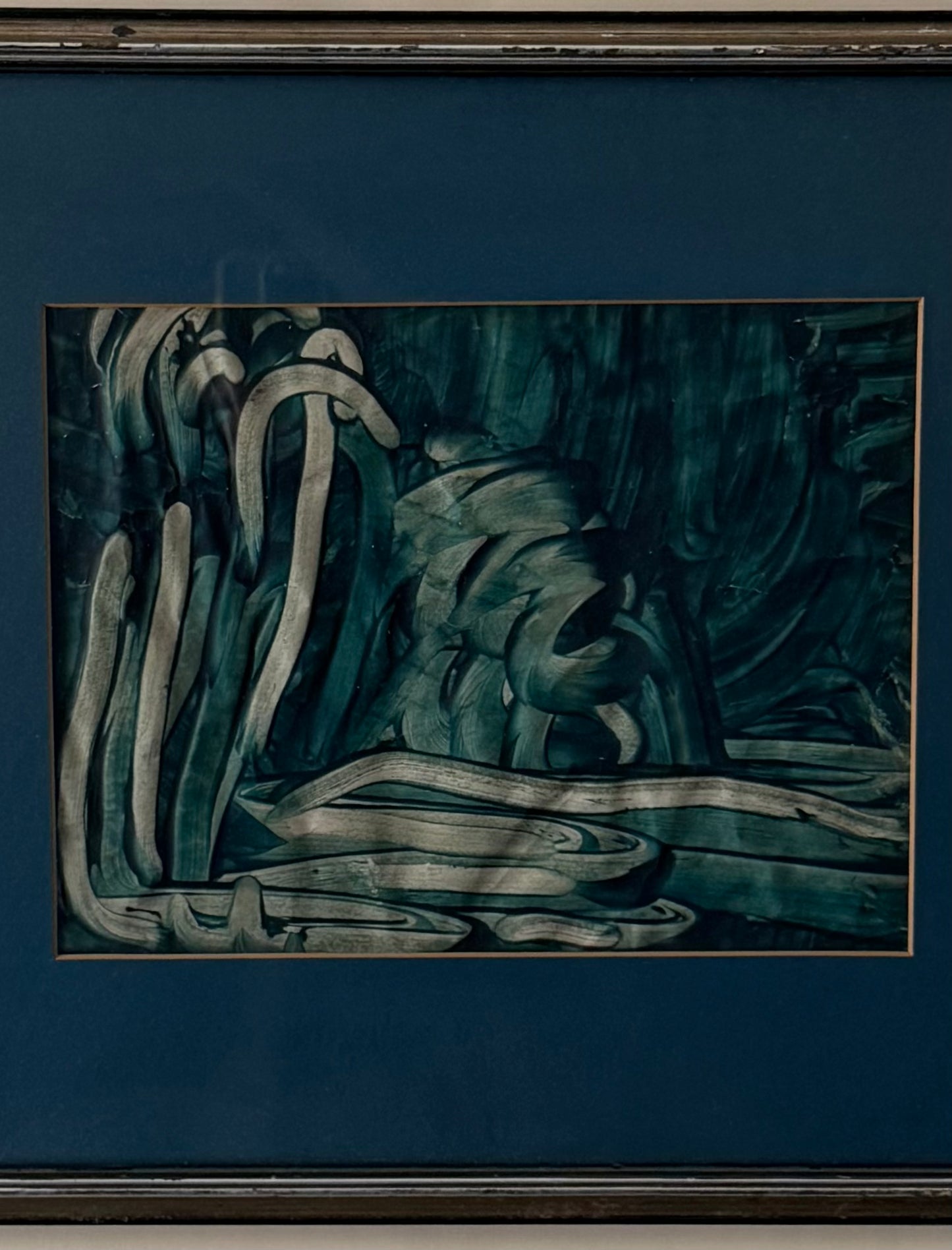 abstract green toned painting with blue mat and silver gilded frame