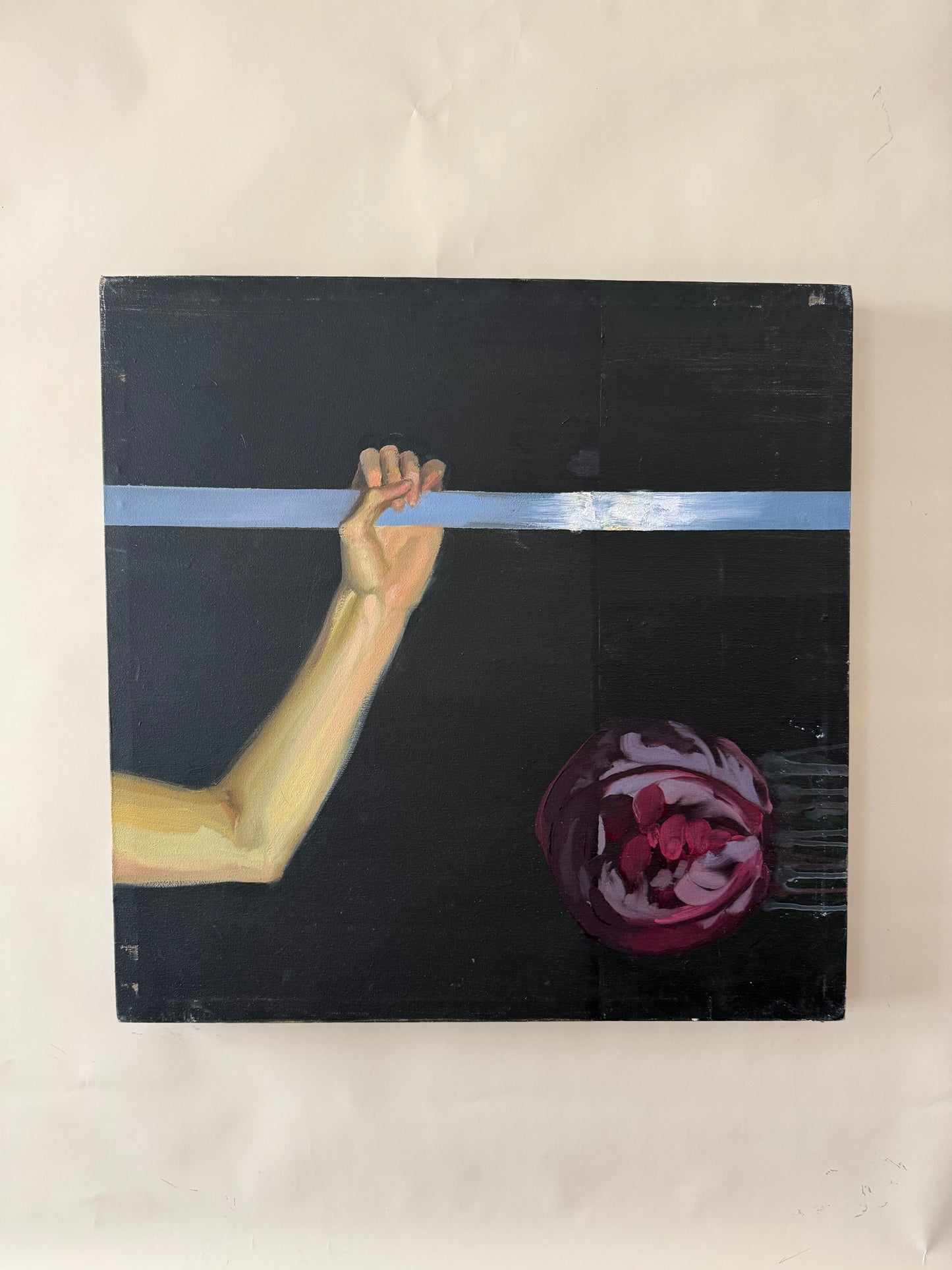 surrealist figural oil painting of arm with slice of sky