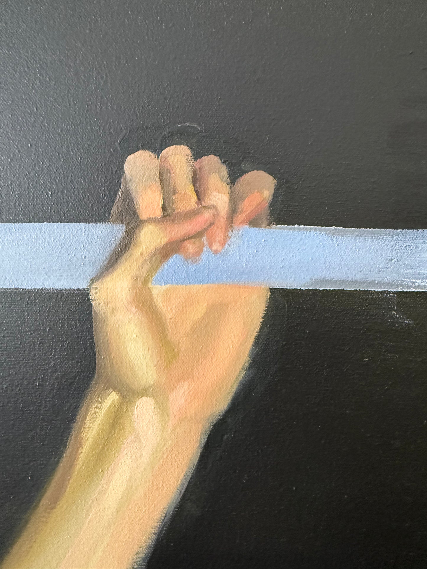 surrealist figural oil painting of arm with slice of sky